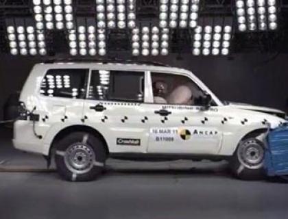 A white Mitsubishi car 