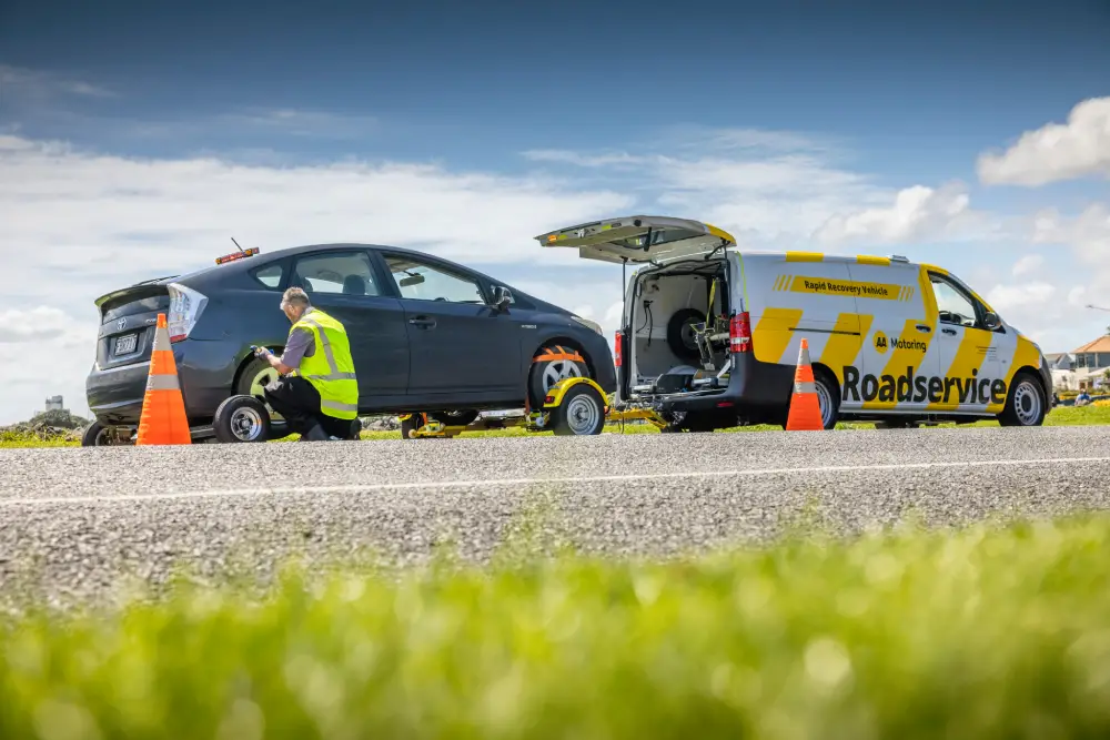 Car being loaded onto a towtruck
