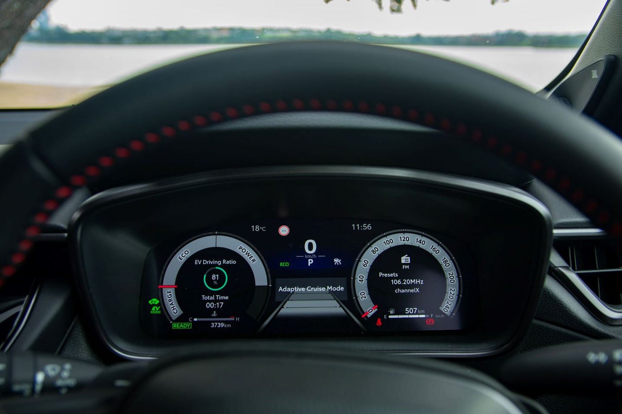 close up of instrument cluster through steering wheel