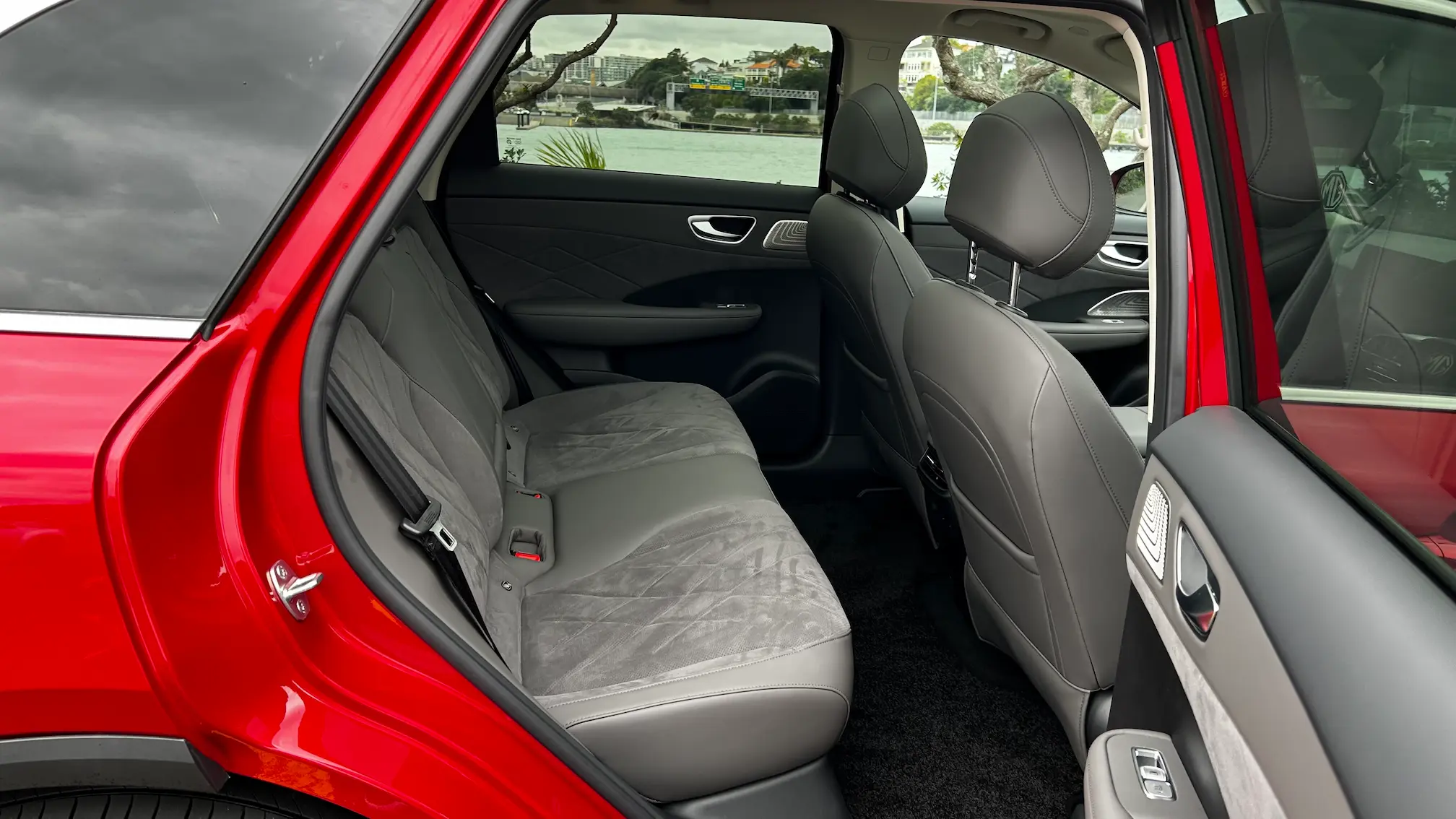 Rear passenger seating area of an MG electric SUV.