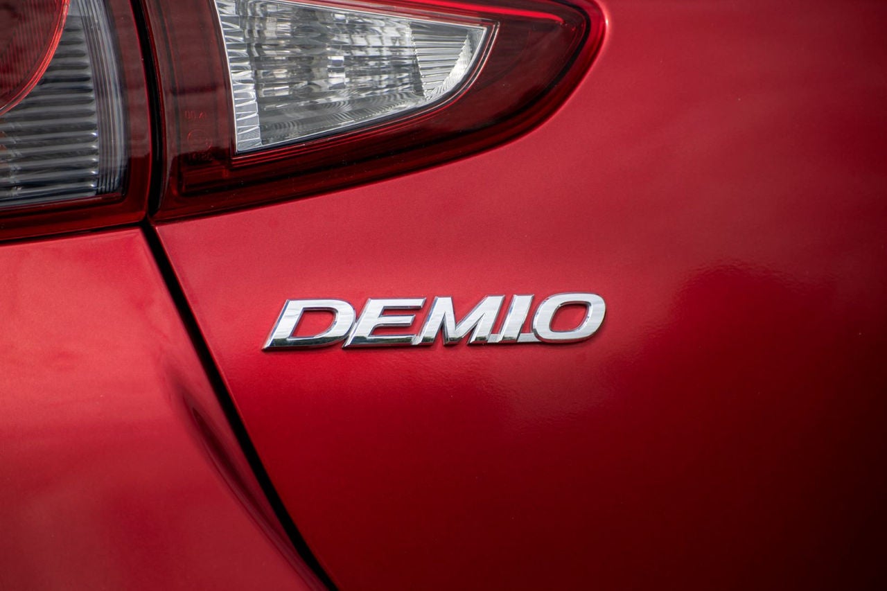 Demio badge
