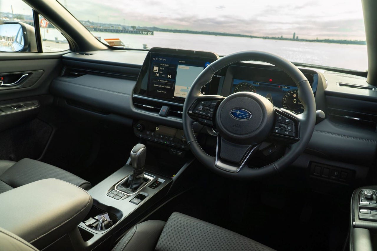 view of Outback dashbaord and steering wheel