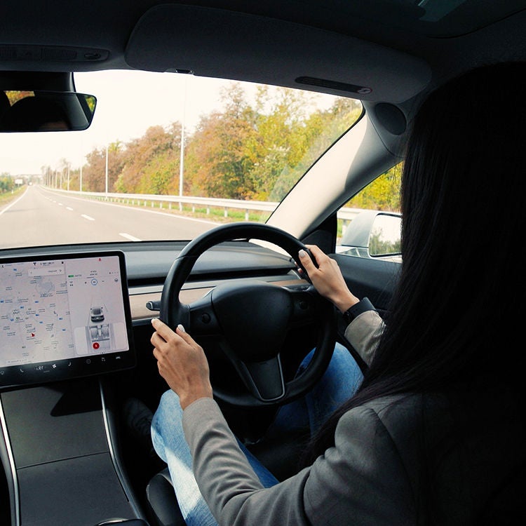 A woman driving EV