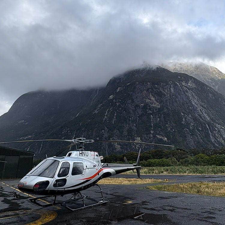 Our helicopter waiting to take off in Milford Sound. Photo by Jo Percival. 