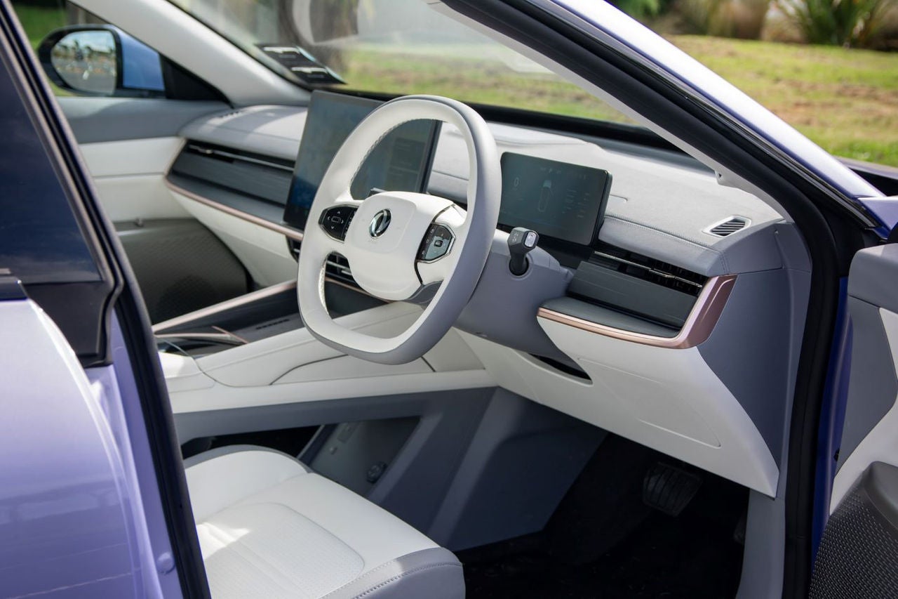 view of driver's seat and steering wheel