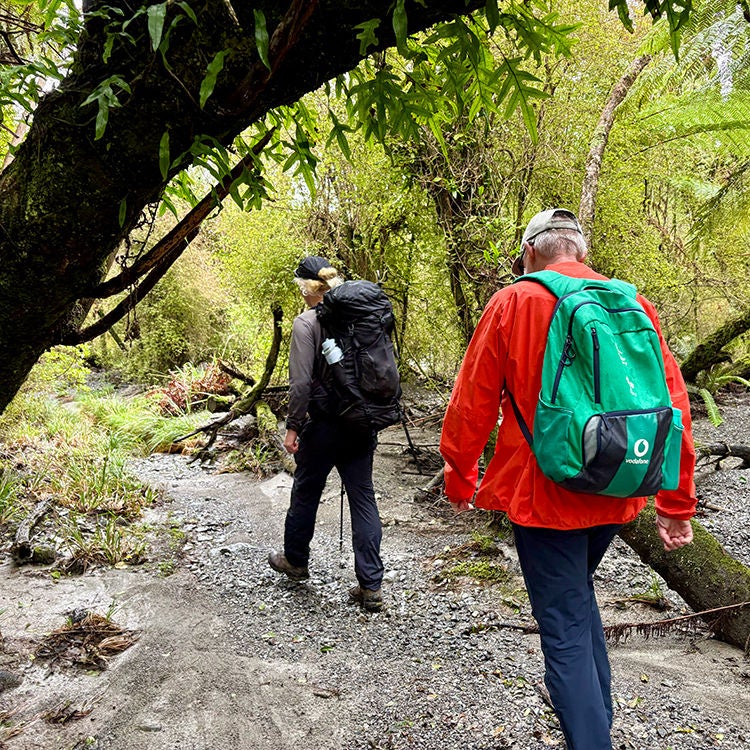 Walking the gravel riverbeds in Fiordland. Photo by Jo Percival.