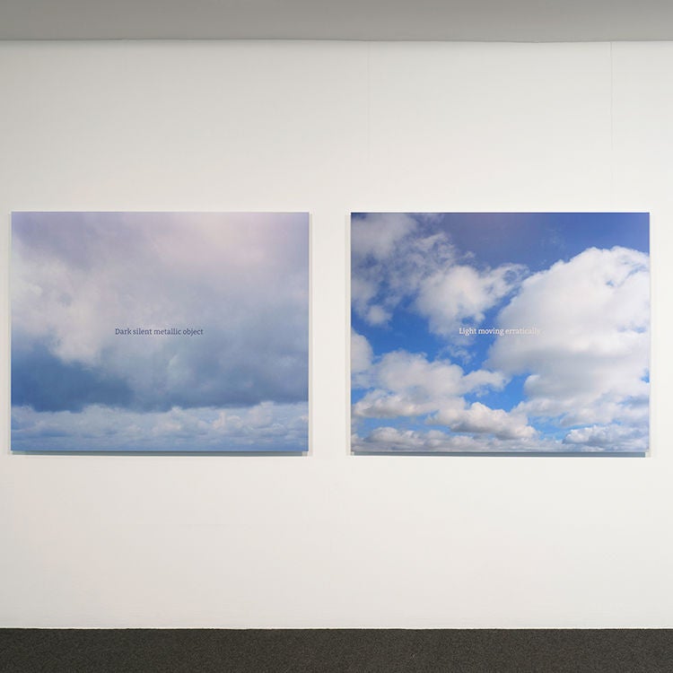Carlyine Boreham's work showing images of clouded sky and text descriptions of UFO sightings