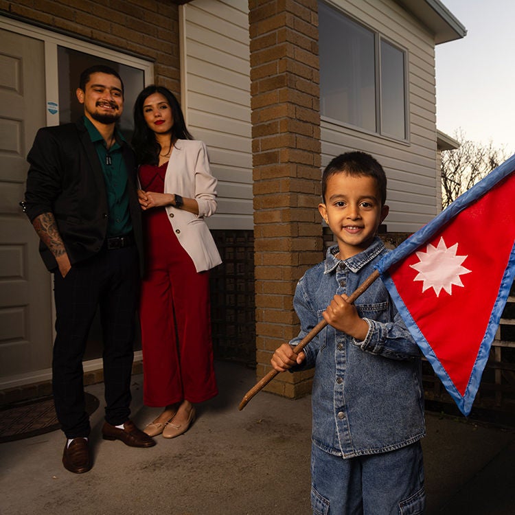 Buying their first home was a tough journey, but worth it for Madan Sapkota. Photo by Alan Gibson.