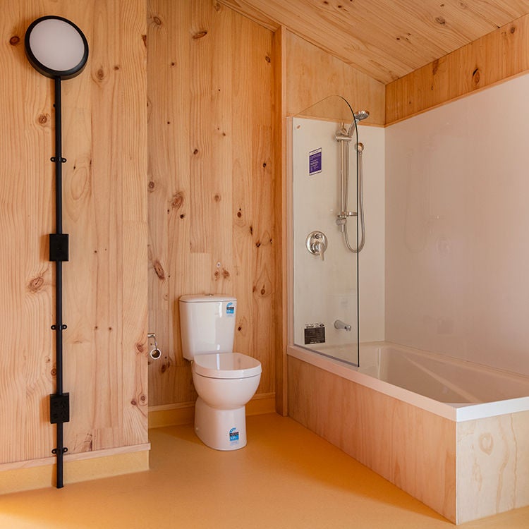 A design element has electrical fittings running up walls encased in black tubes. Photo by Alan Gibson.