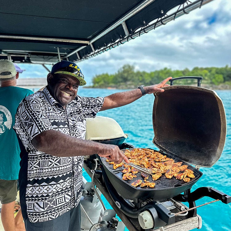 A barbecue lunch on board Major Tom. Photo by Monica Tischler.