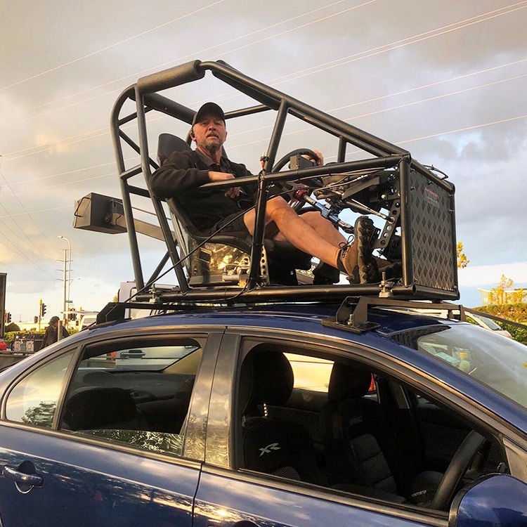 Mark Harris working on set as a stunt driver.