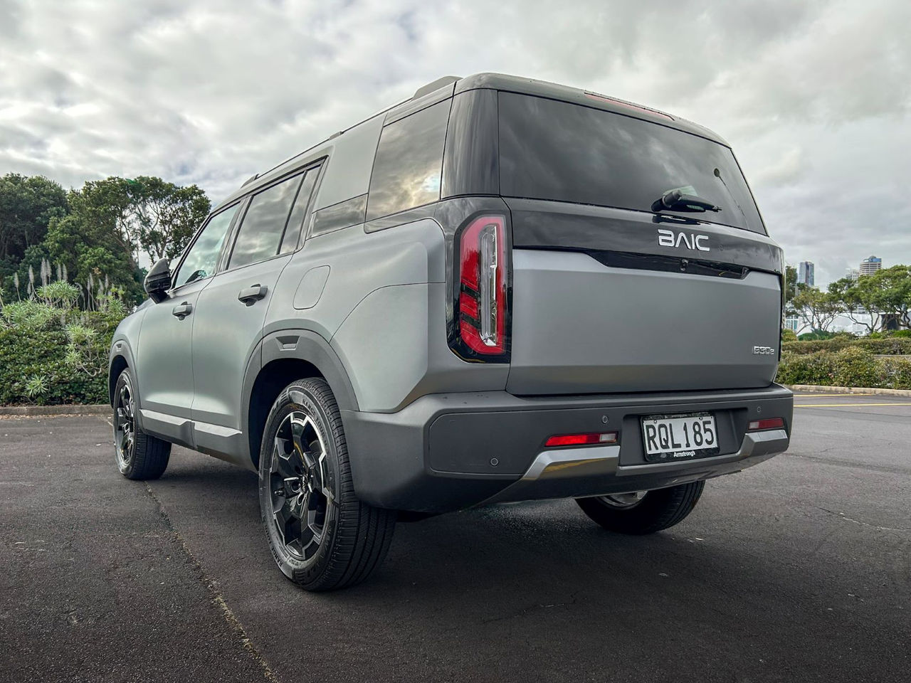 rear quarter view of grey SUV