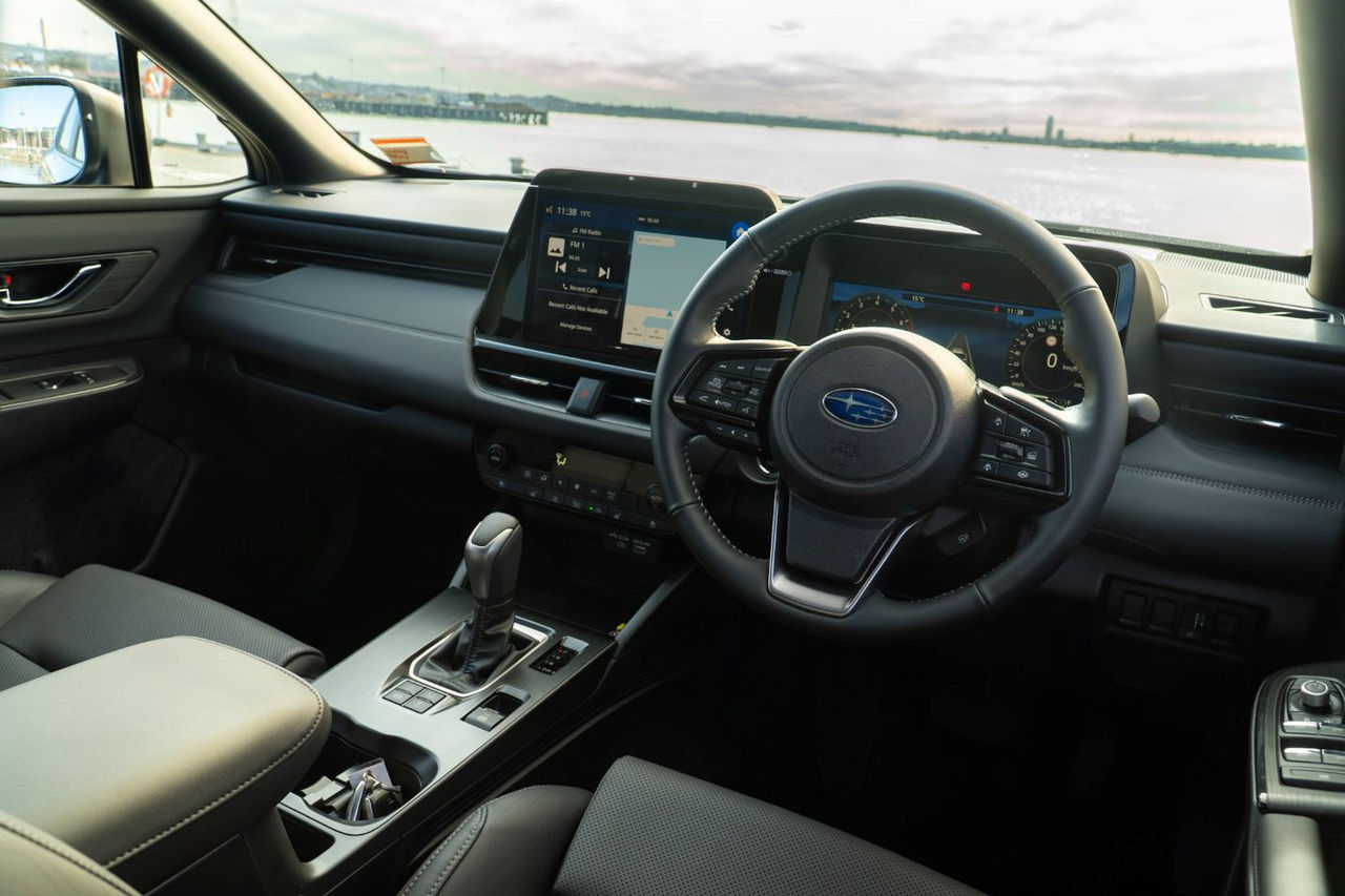 view of Outback dashbaord and steering wheel