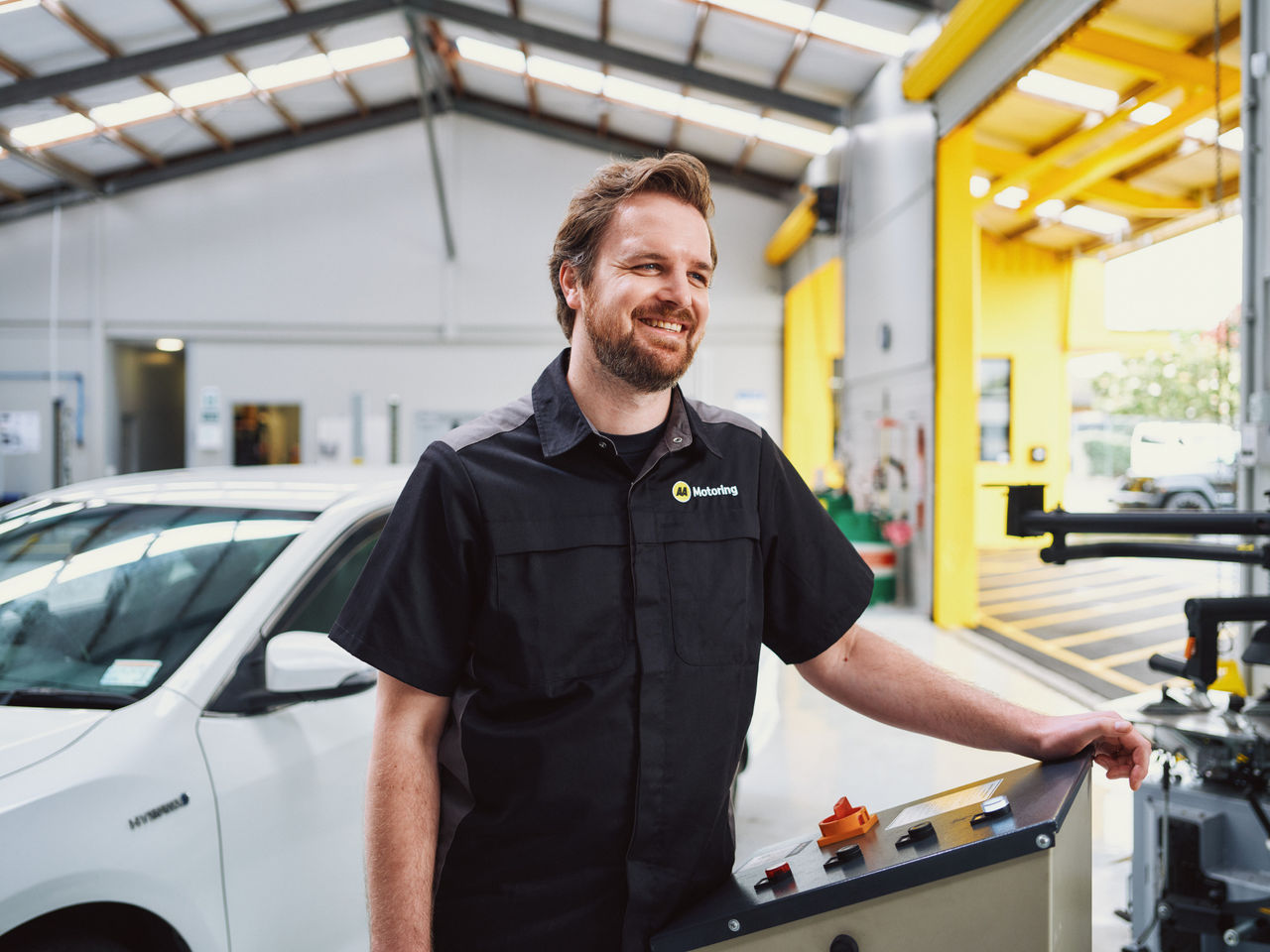 AA Auto Centre worker standing in workshop