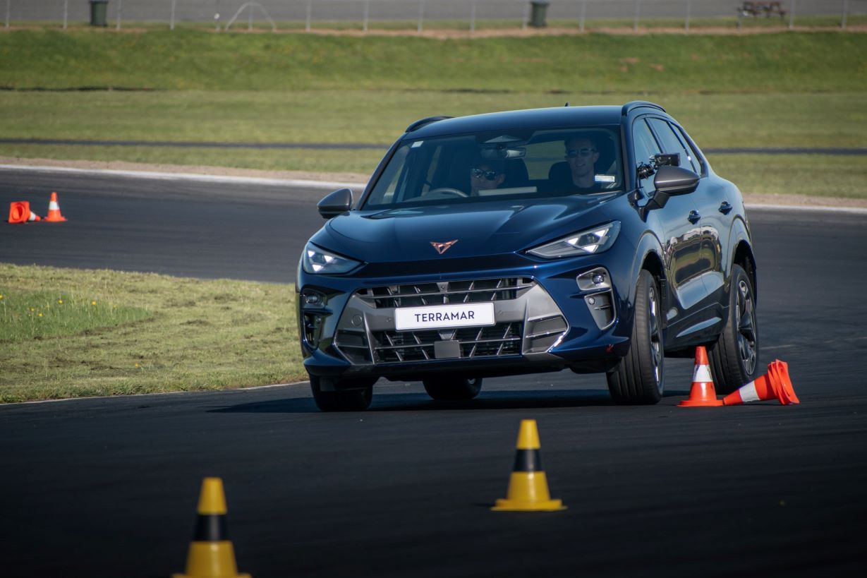 front view of cupra turning left on slalom course