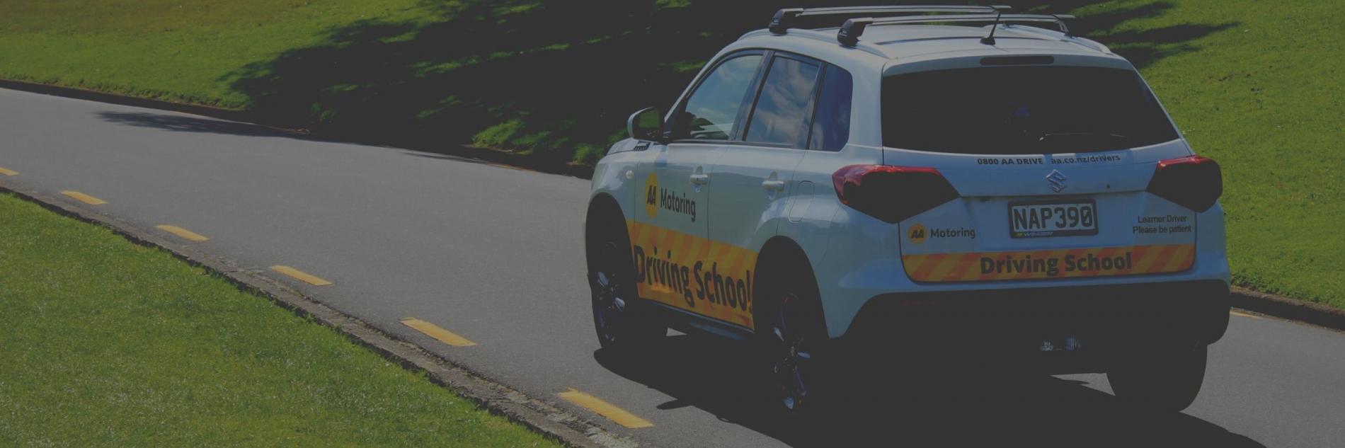 AA Driving School car on the road