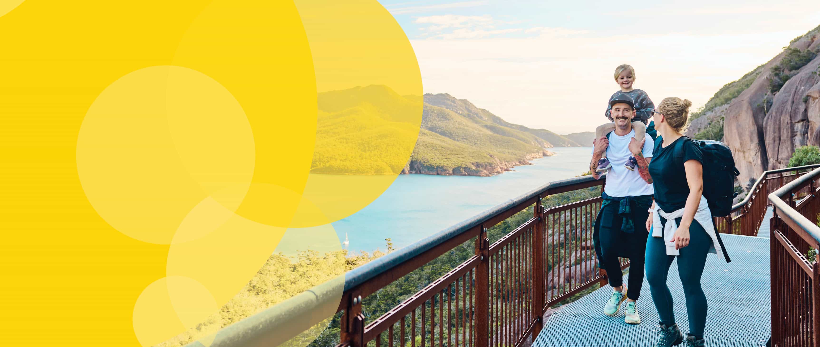 Mother, father and son walking and smiling