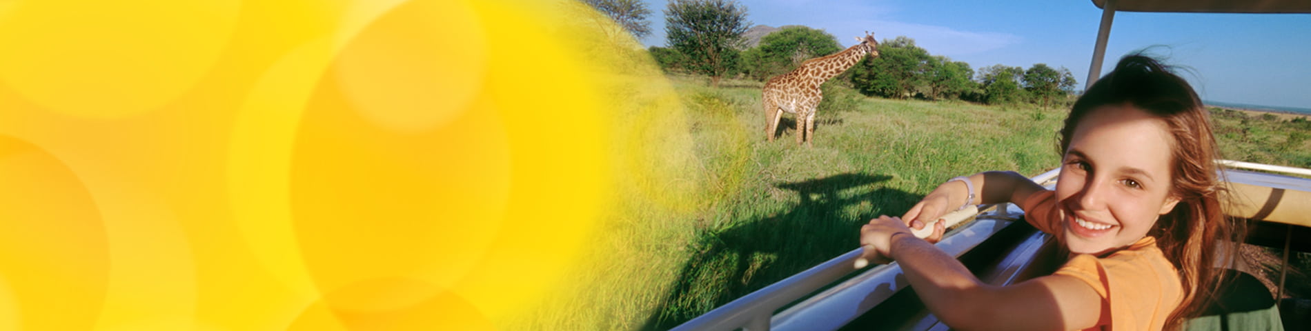 Smiling girl enjoying a safari ride
