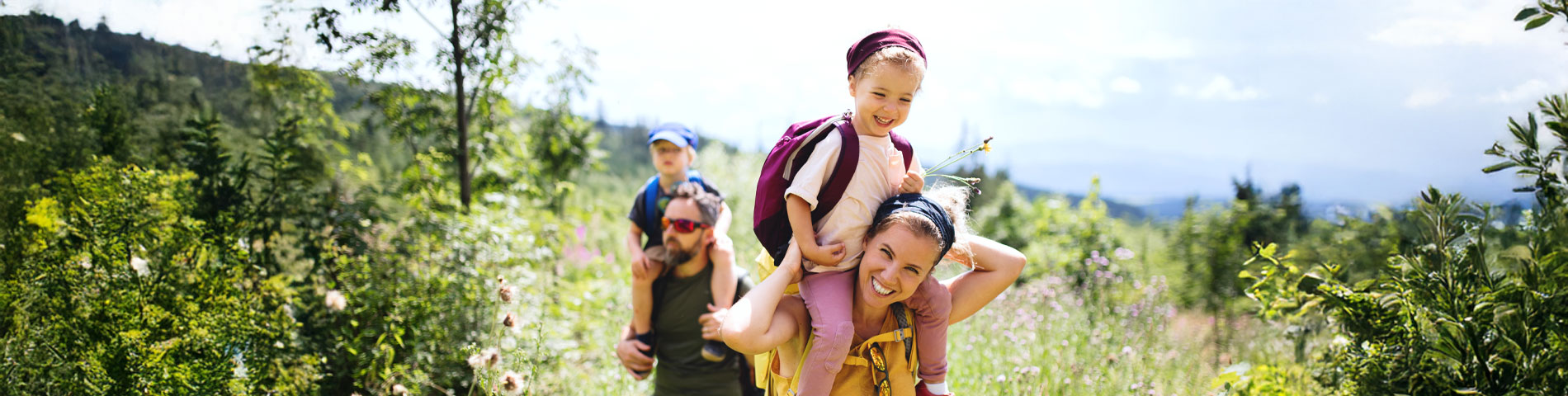 Family walking and smiling