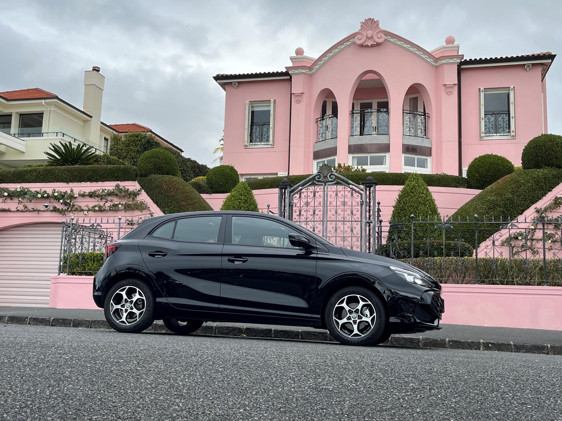 2024 MG3 car parked in front of a pink house