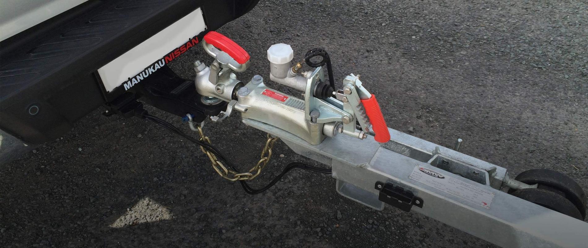 Tow hitch connected to a trailer.