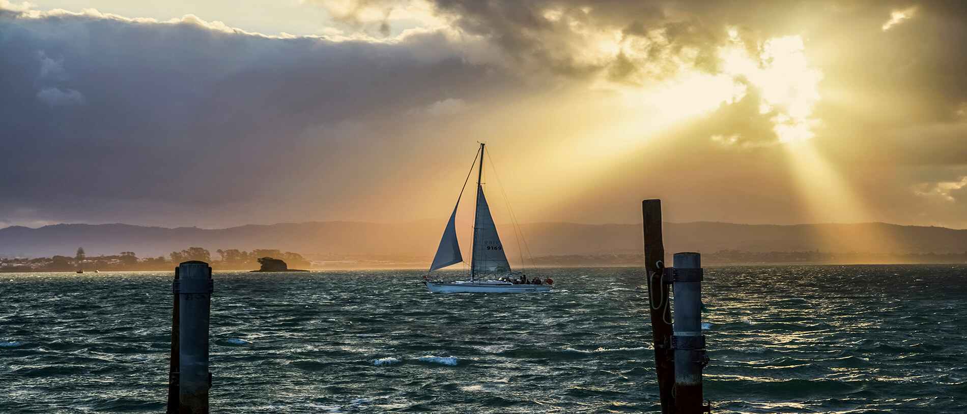 Sailing in moody weather taken from Northcote Wharf
