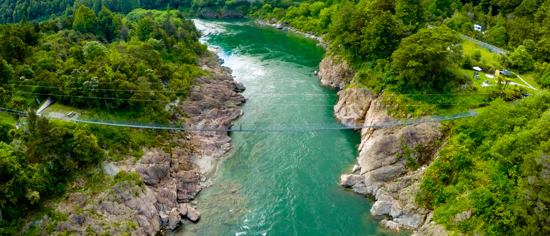 Cross the Buller river on one of New Zealand’s longest swing bridges