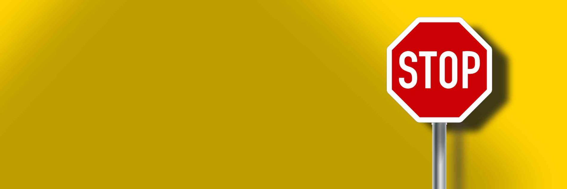 Stop sign with a gradient yellow background