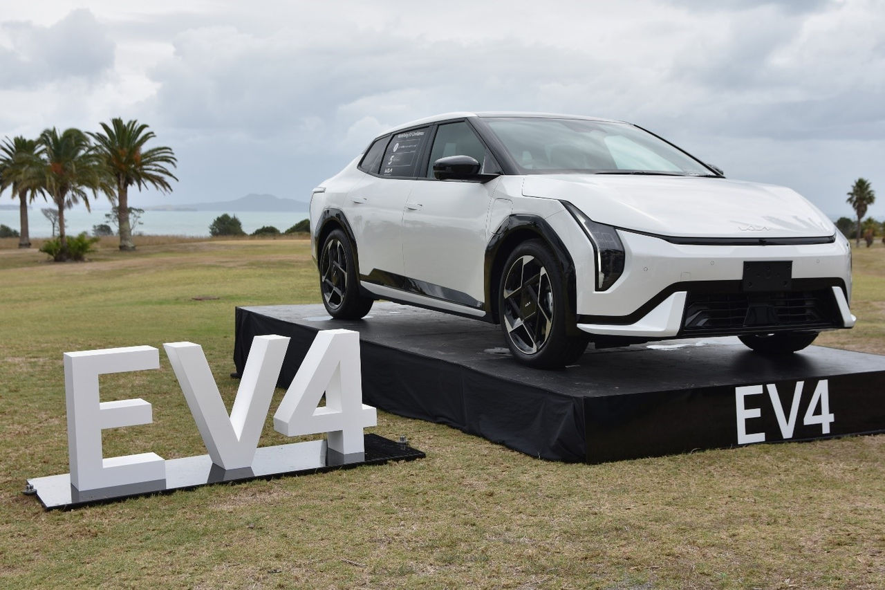 Parked White Kia EV 4