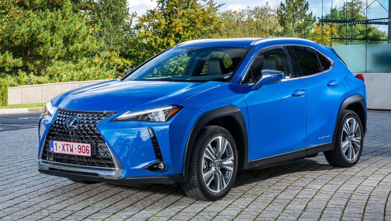 A blue Lexus UX300E car parked on a road