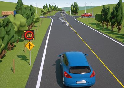 Simulation of a blue car approaching a rural intersection at 70km/h speed detected by a sensor.