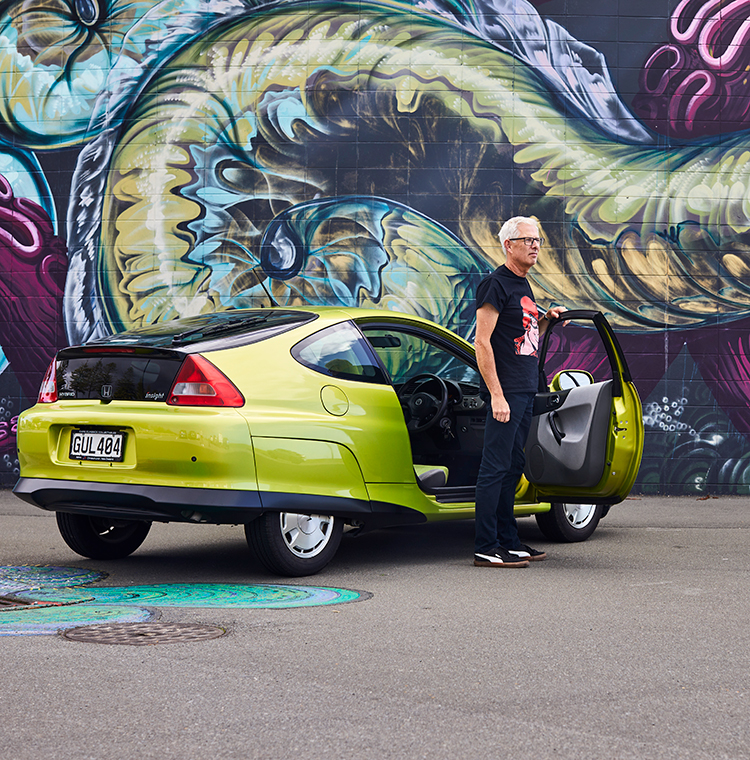 Andrew and his unusual Honda Insight. Photo by Charlotte Anderson.