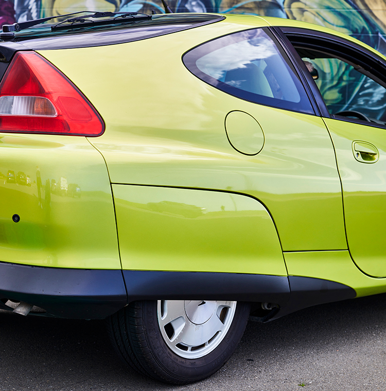 The 2000 Honda Insight has unusual, streamlined wheels. Photo by Charlotte Anderson.