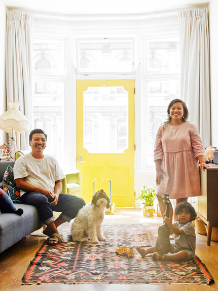 Ana, Rob, Aro and Chester Barbono in their apartment