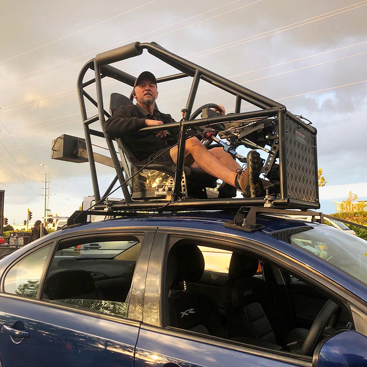 Mark Harris working on set as a stunt driver.