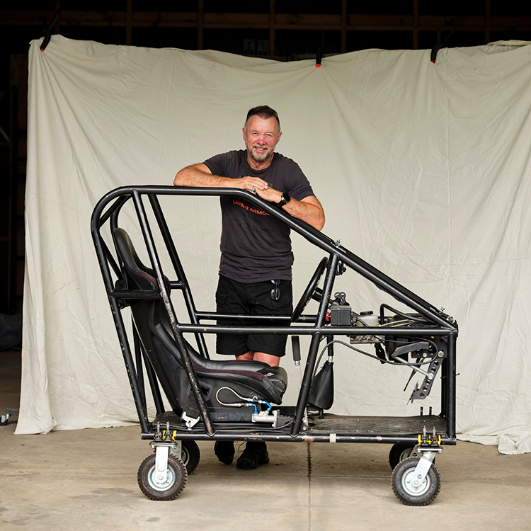 Stunt man Mark Harris with one of his driving rigs. Photo by Mark Smith.