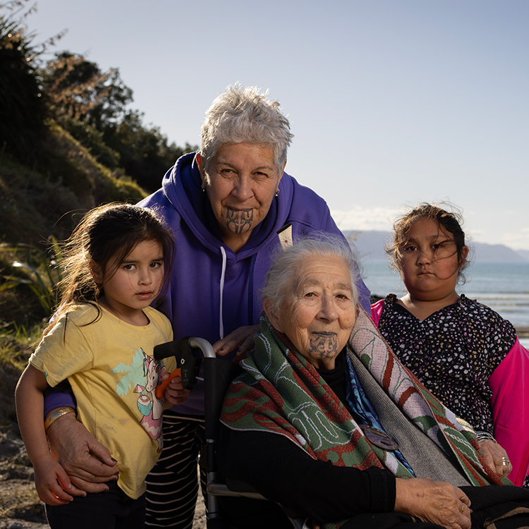  Pauline Tangiora with some of her whānau in Māhia. Photo by Tessa Chrisp.