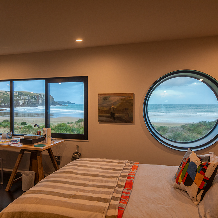  Features like circular windows anchor the crib to its marine setting. 