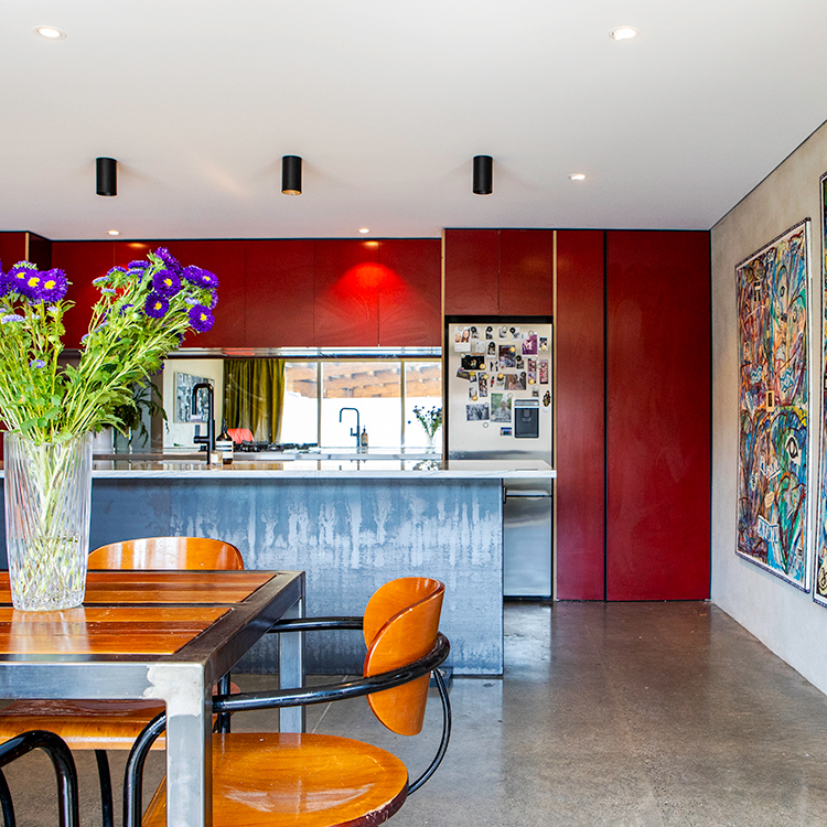  The kitchen is the hub for entertaining in the fish factory home. Photo by Nicola Edmonds.