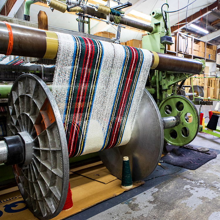 The weaving machines at work at the Masterweave factory. Photo by Nicola Edmonds.