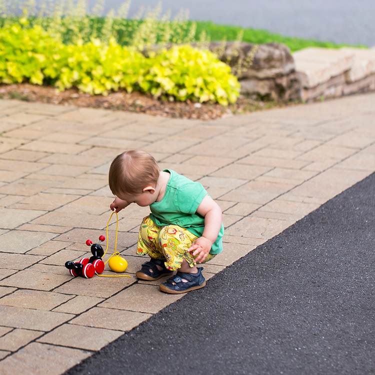 Baby in driveway