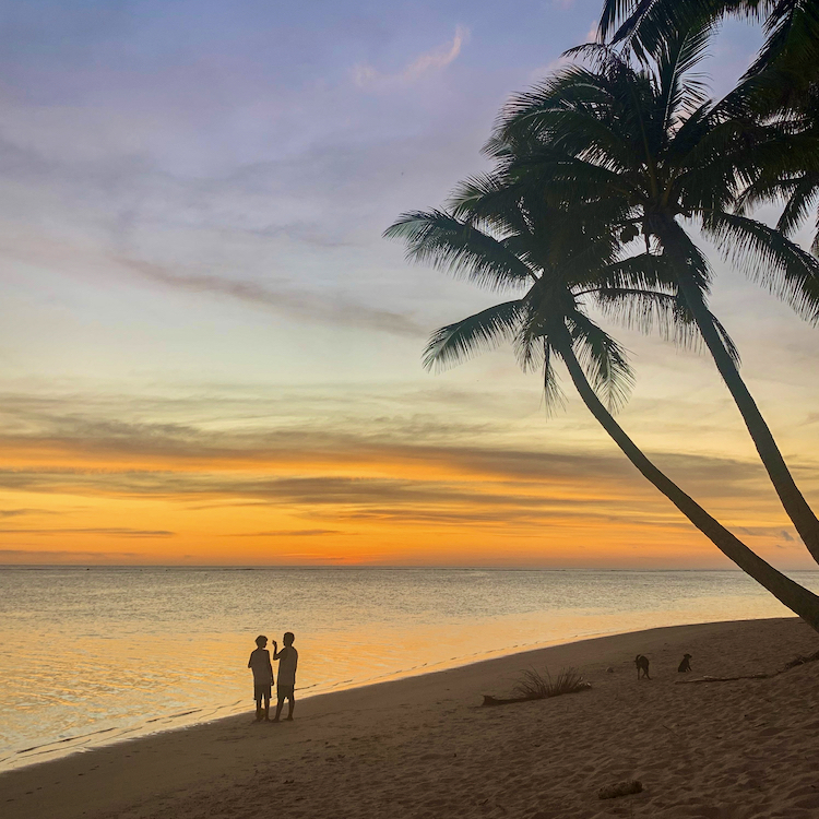  Soaking up a Rarotongan sunset. Photo by Monica Tischler.