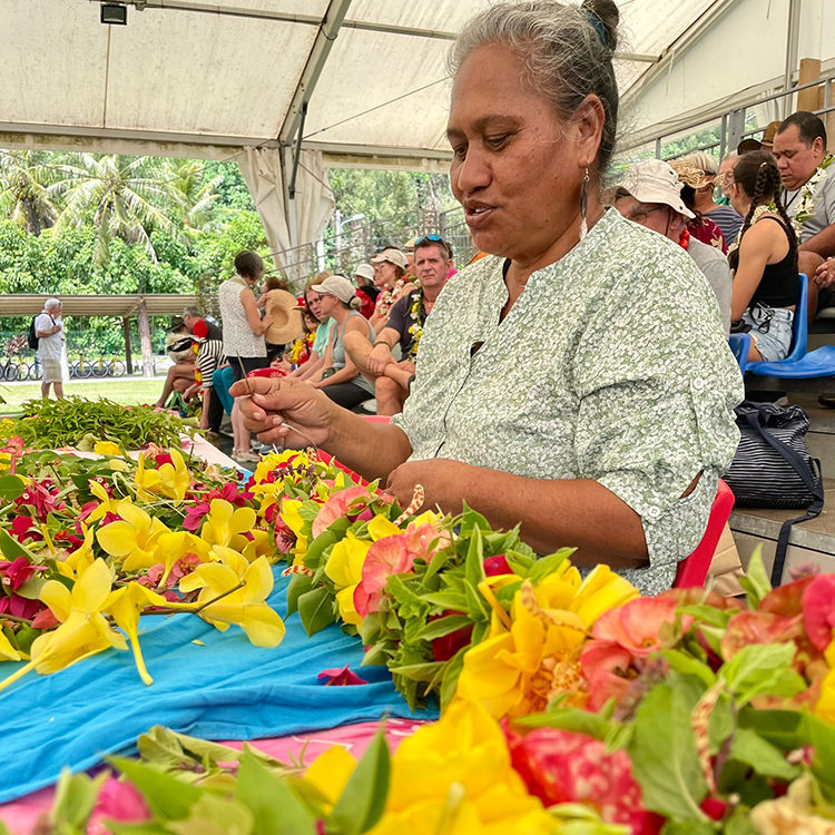  Making beautiful floral lei on Raivavae. Photo by Jo Percival.