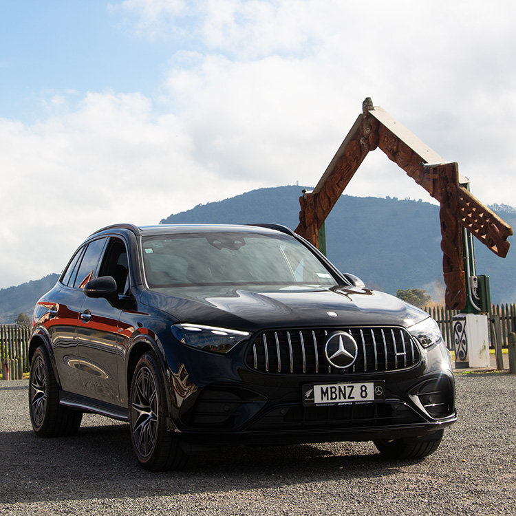 Black Mercedes AGM-GLC with hot pools in foreground.
