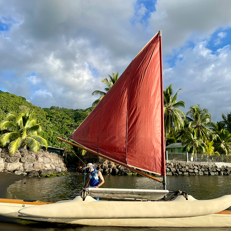 Setting sail on a traditional va'a triple-hulled canoe in Papeete. Photo by Jo Percival.