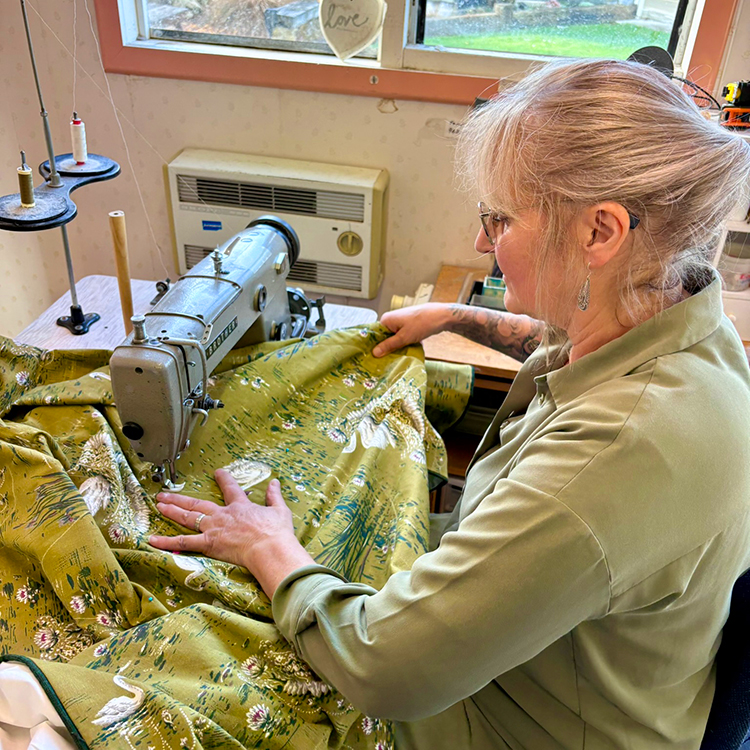 Anita Carter makes eiderdowns in her Pahiatua studio. Photo by Jo Percival.