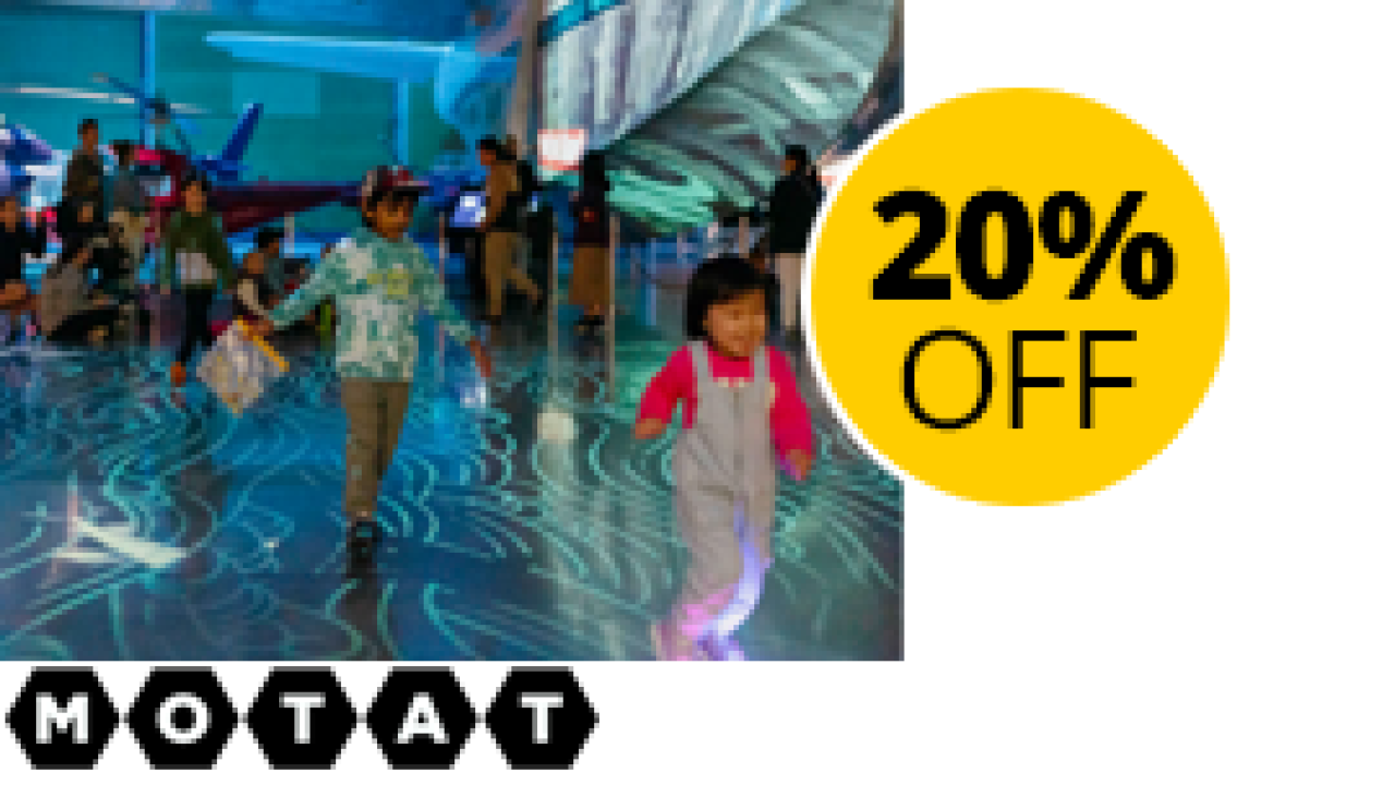 20% Off sticker overlaying a photo of children looking at a Motat exhibit