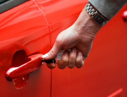 Person unlocking car door