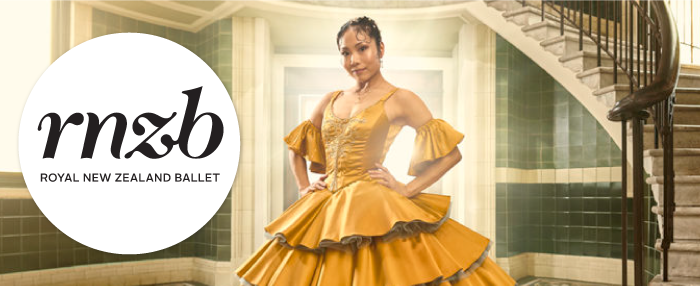 A woman wearing a gold gown for Royal New Zealand Ballet