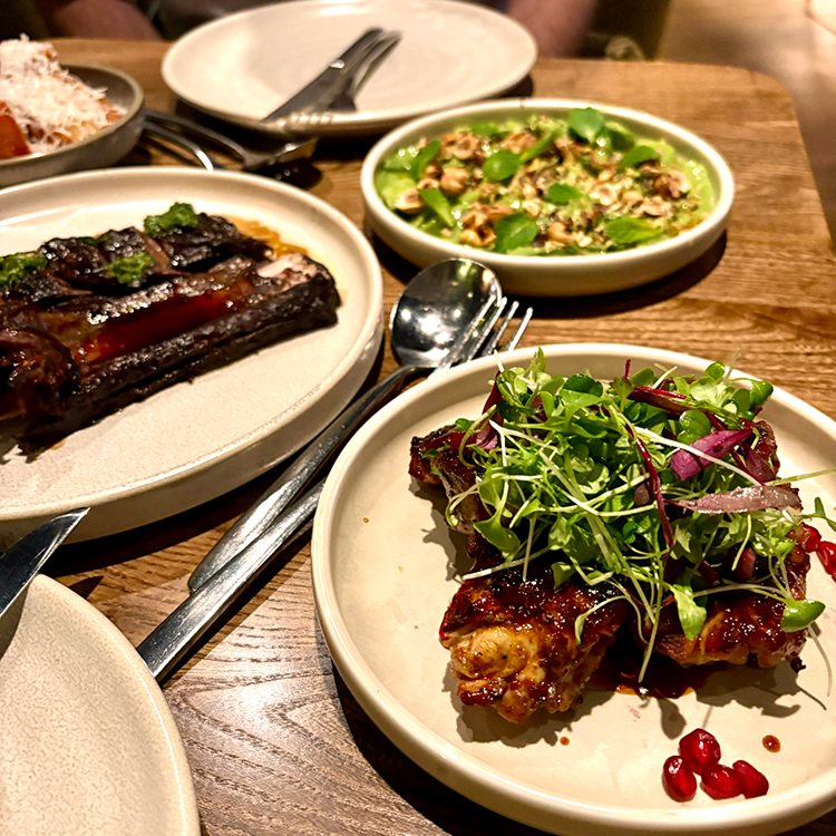  Slow-cooked beef and harissa chicken at Roca. Photo by Jo Percival.
